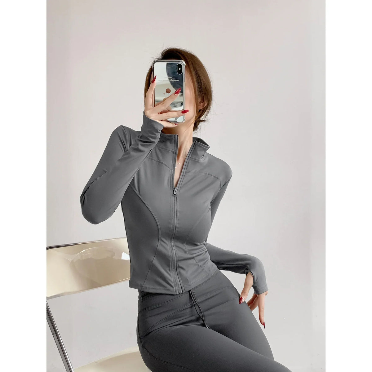 Chaqueta deportiva ajustada de secado rápido para mujer
