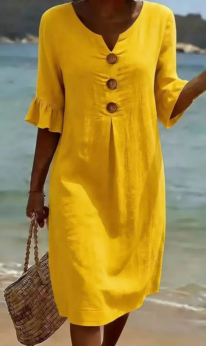 Vestido de algodón y lino con botones y volante