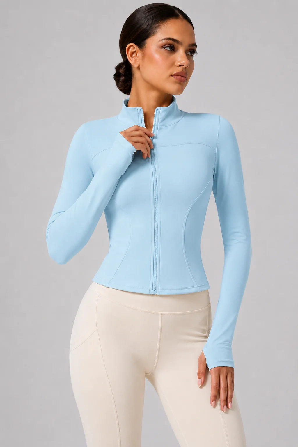 Chaqueta deportiva entallada con cremallera para mujer