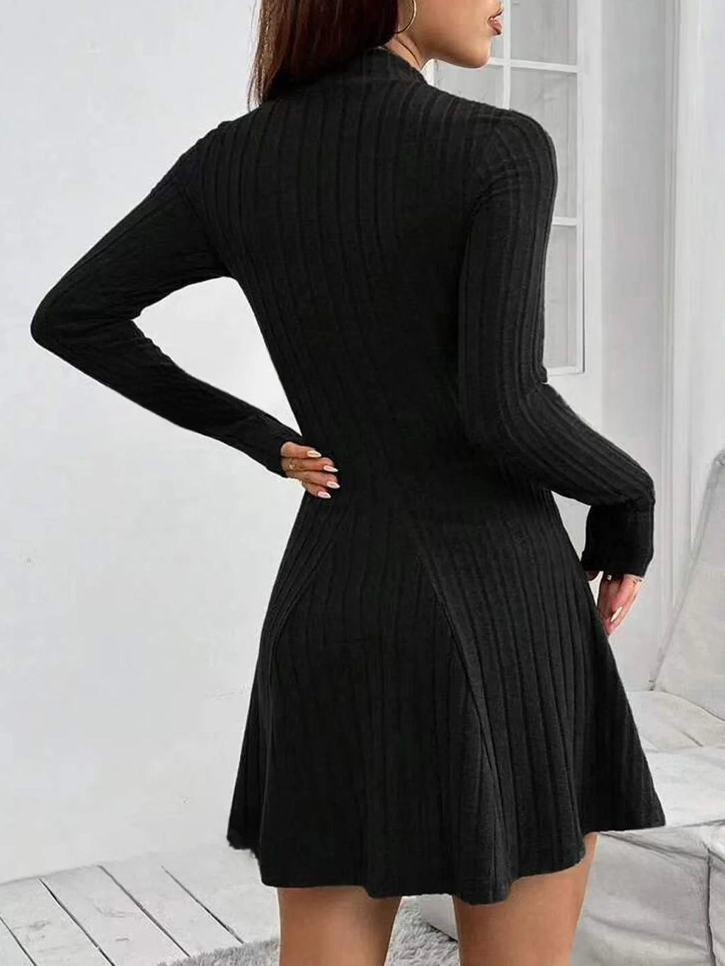Vestido de punto entallado con falda evasé