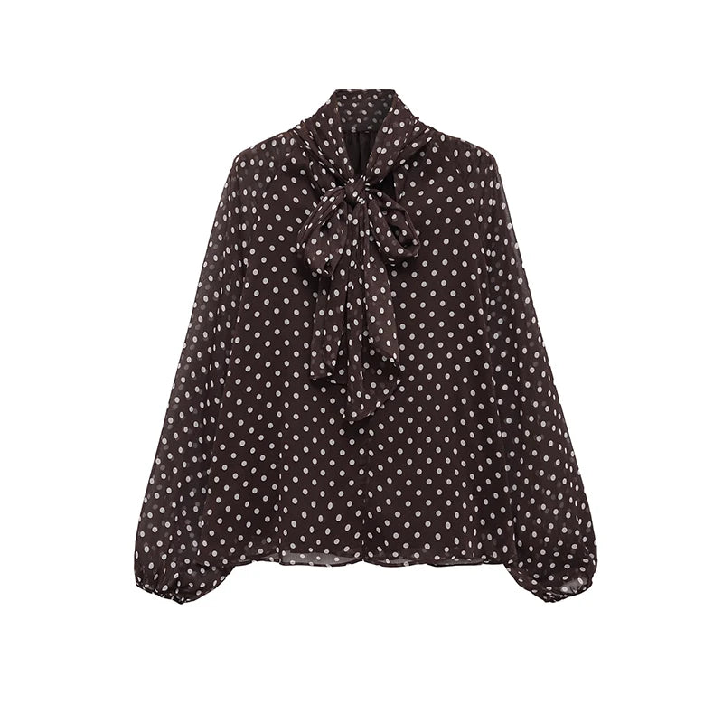 Blusa de lunares con lazo en el cuello