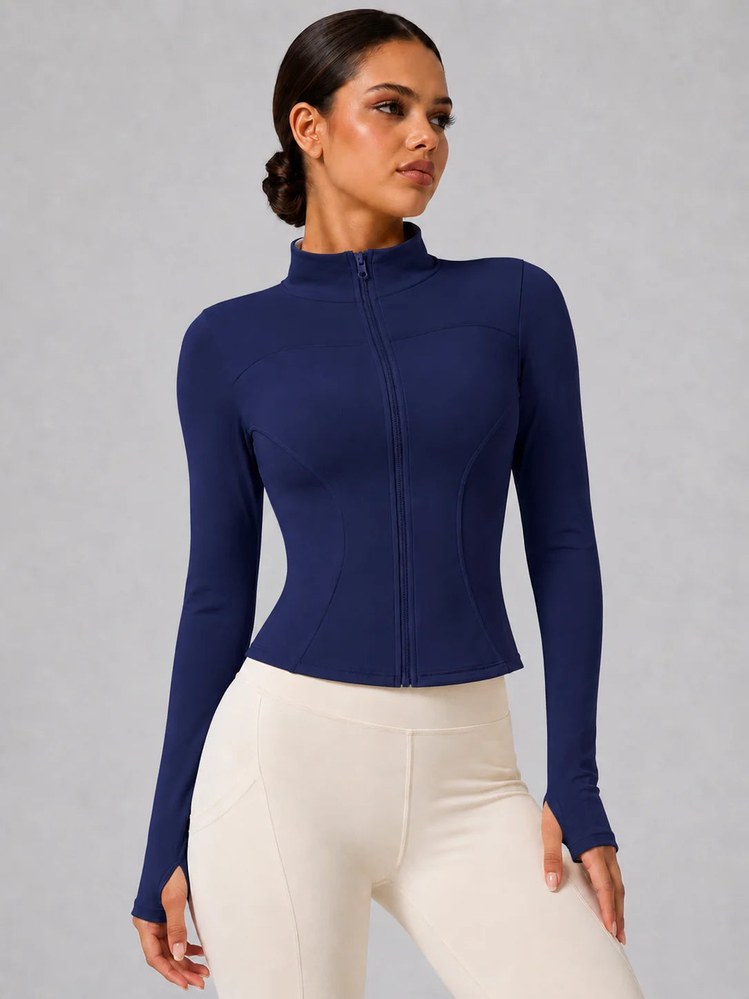 Chaqueta deportiva entallada con cremallera para mujer