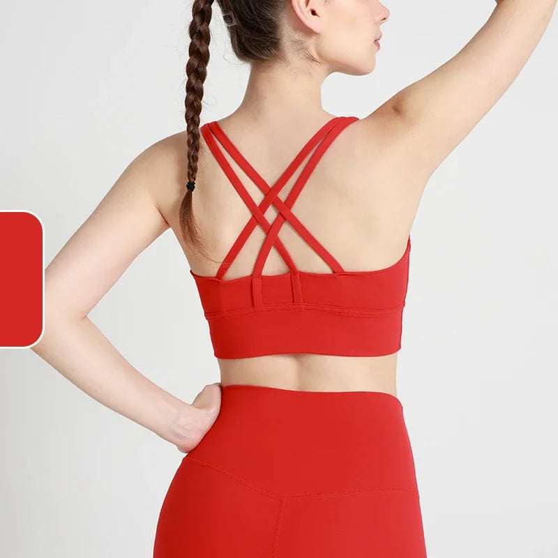 Top deportivo de espalda cruzada para mujer
