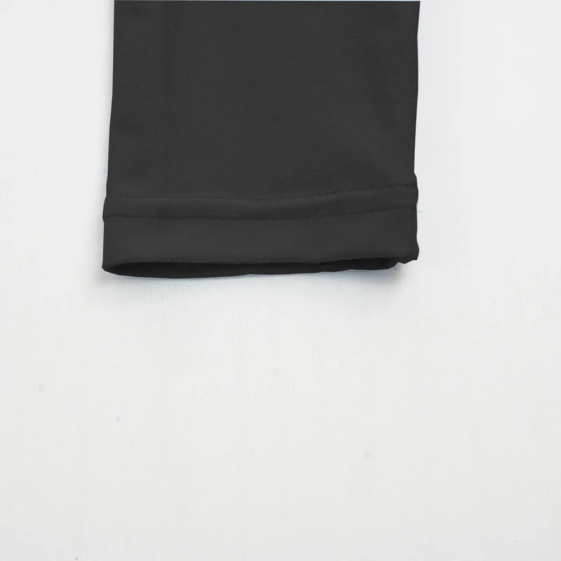 Conjunto de top corto de manga larga y falda midi