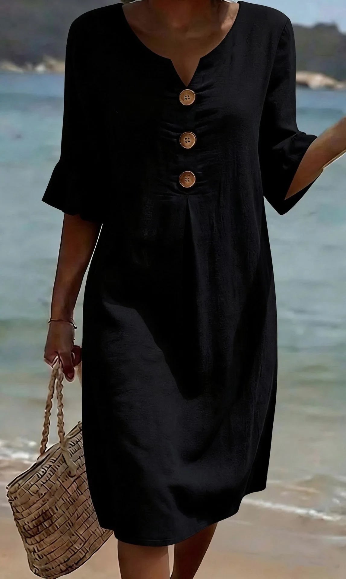 Vestido de algodón y lino con botones y volante