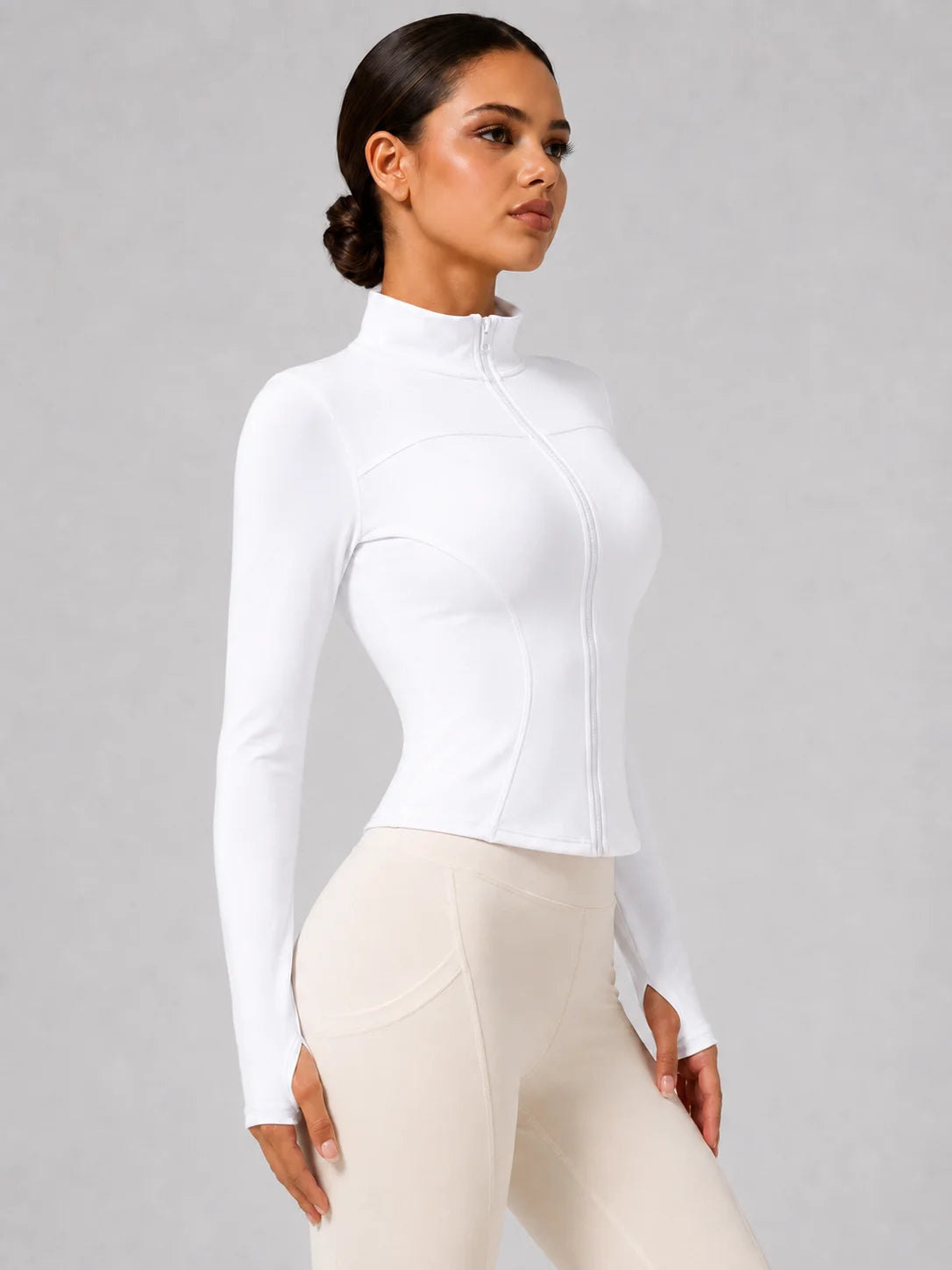 Chaqueta deportiva entallada con cremallera para mujer