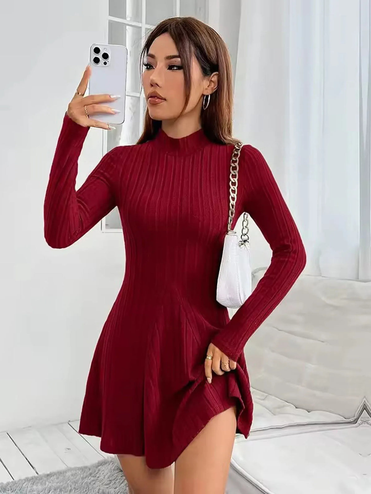 Vestido de punto entallado con falda evasé