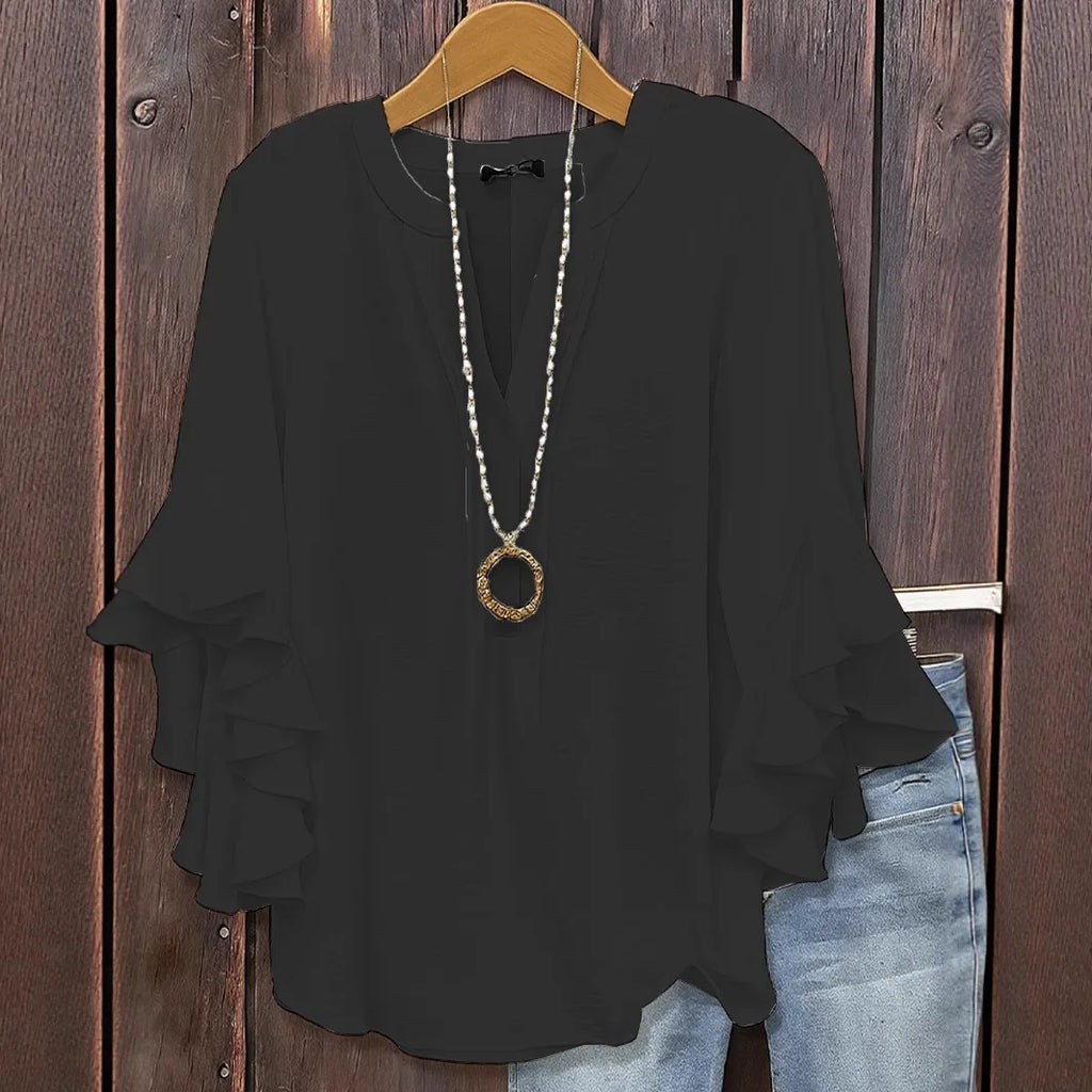 Blusa de gasa con manga de volantes y cuello en V
