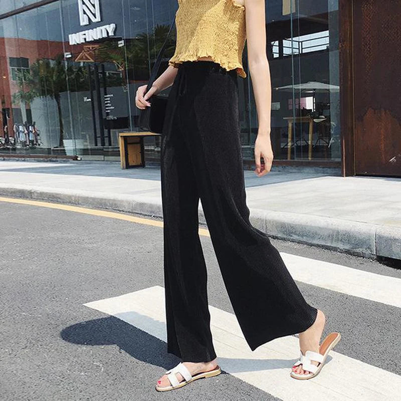 Pantalón ancho plisado de seda fría para mujer