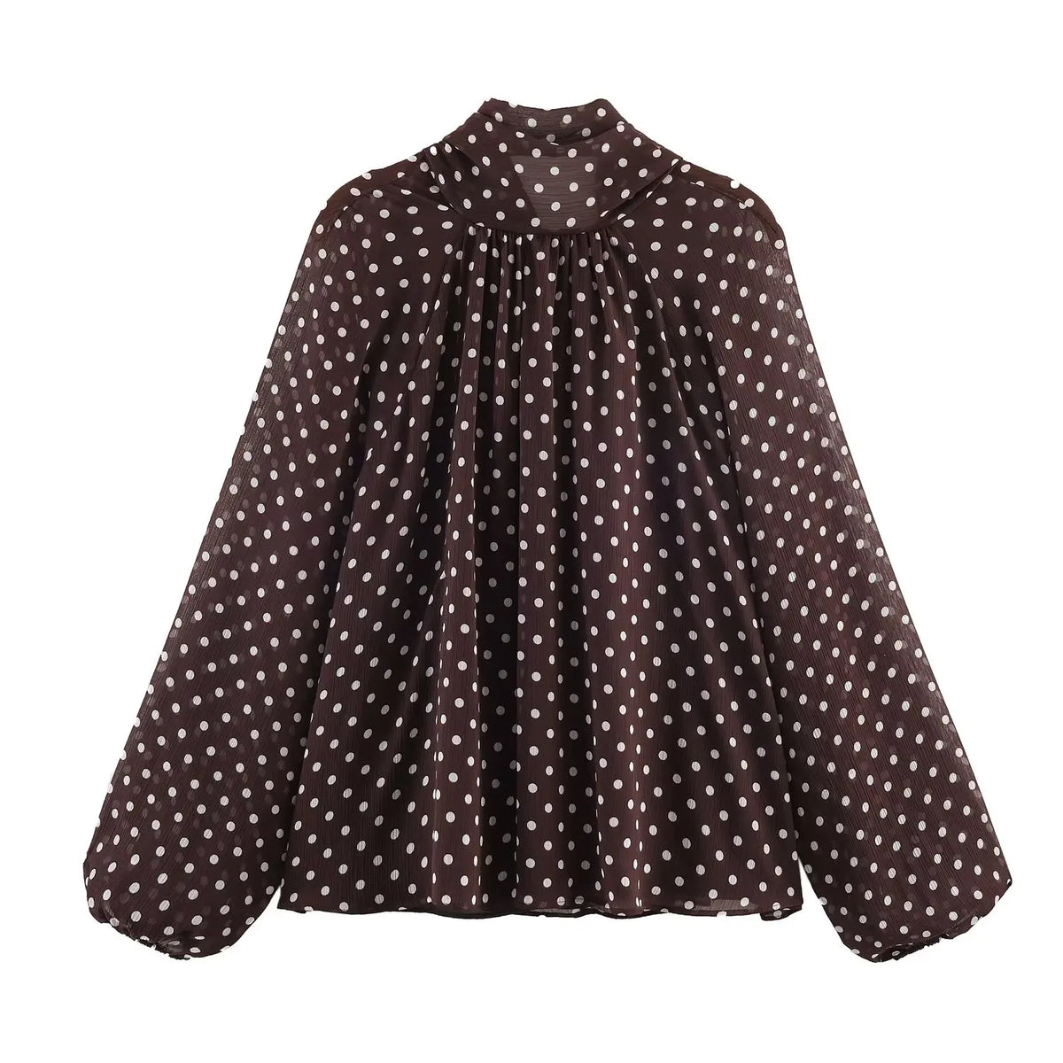Blusa de lunares con cuello alto