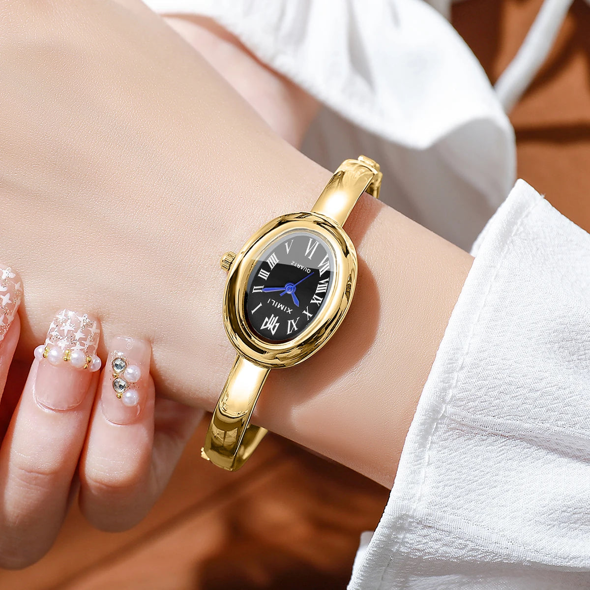 Reloj ovalado con números romanos para mujer
