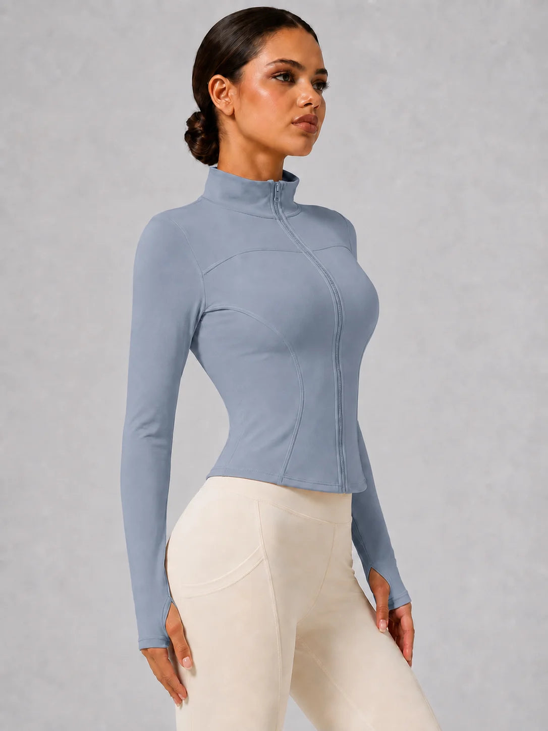 Chaqueta deportiva entallada con cremallera para mujer