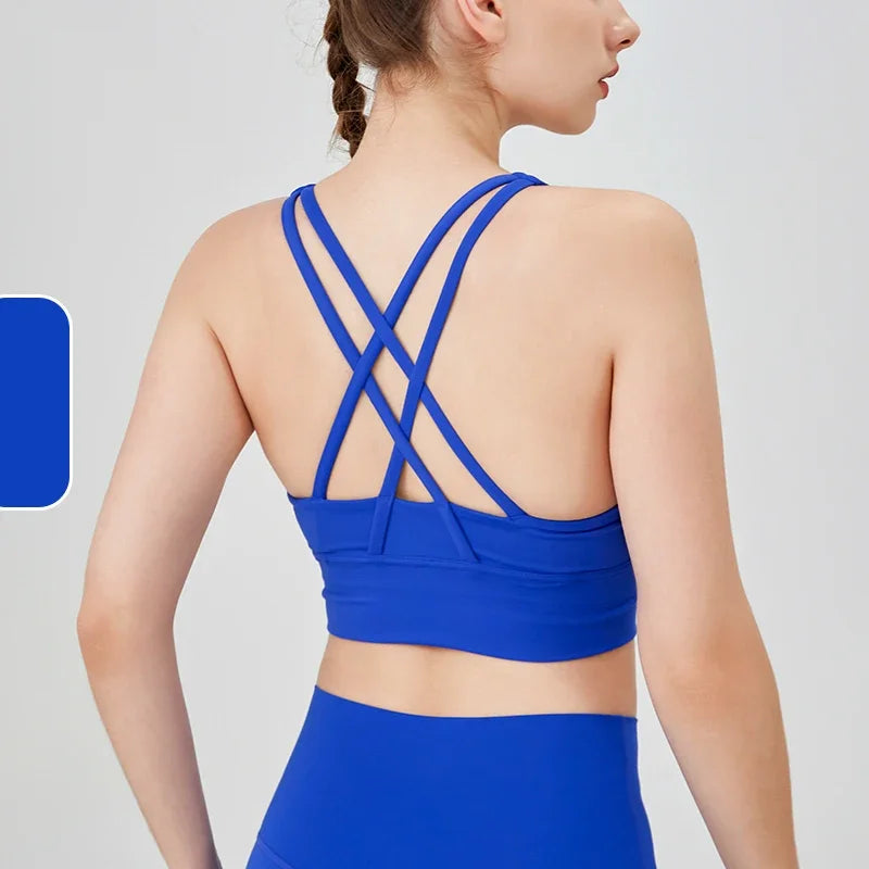 Top deportivo de espalda cruzada para mujer
