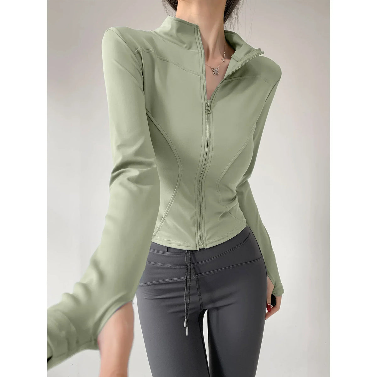 Chaqueta deportiva ajustada de secado rápido para mujer