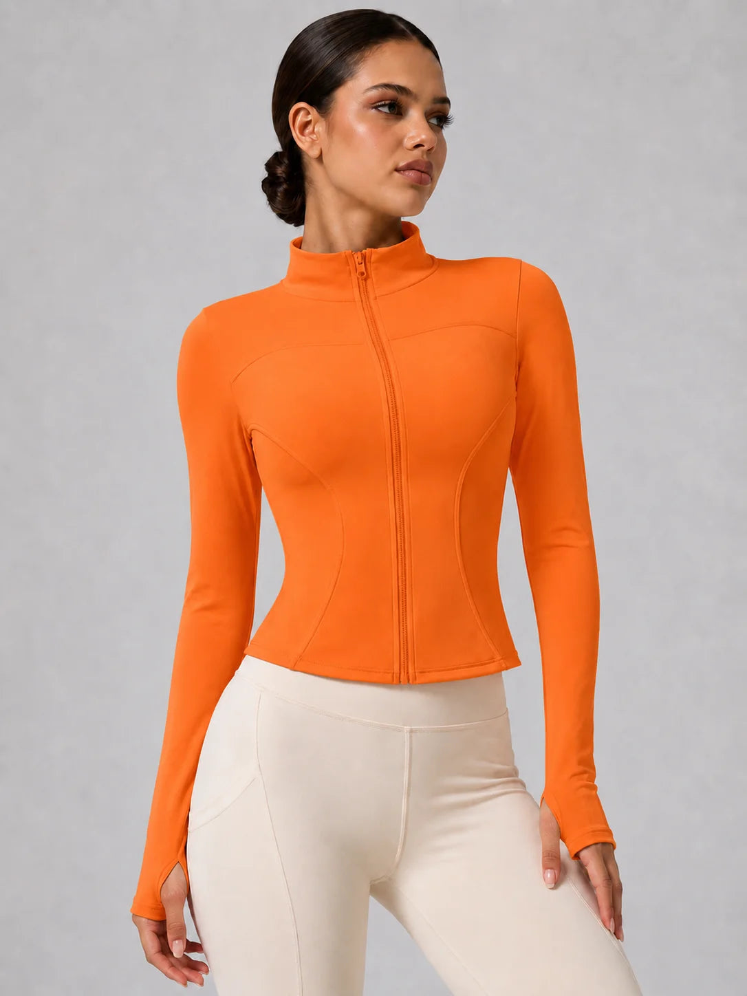 Chaqueta deportiva entallada con cremallera para mujer