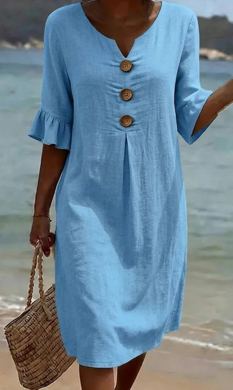 Vestido de algodón y lino con botones y volante