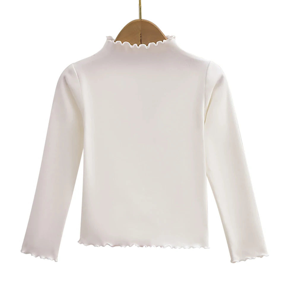 Camiseta de manga larga con cuello de volante para niña