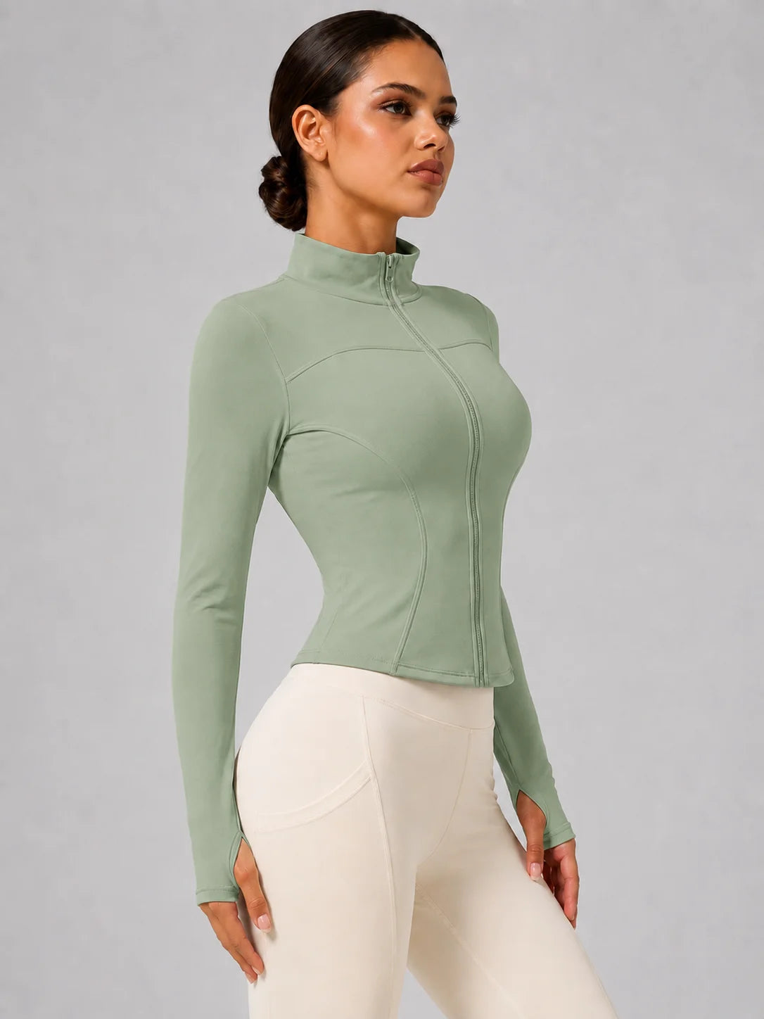 Chaqueta deportiva entallada con cremallera para mujer