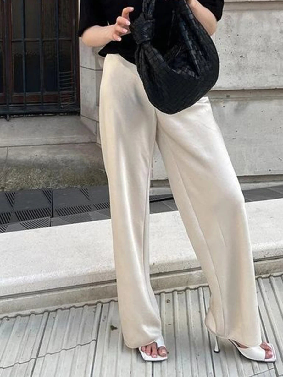 Pantalón ancho de satén con cintura elástica
