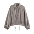 Chaqueta de cuadros con cordón ajustable
