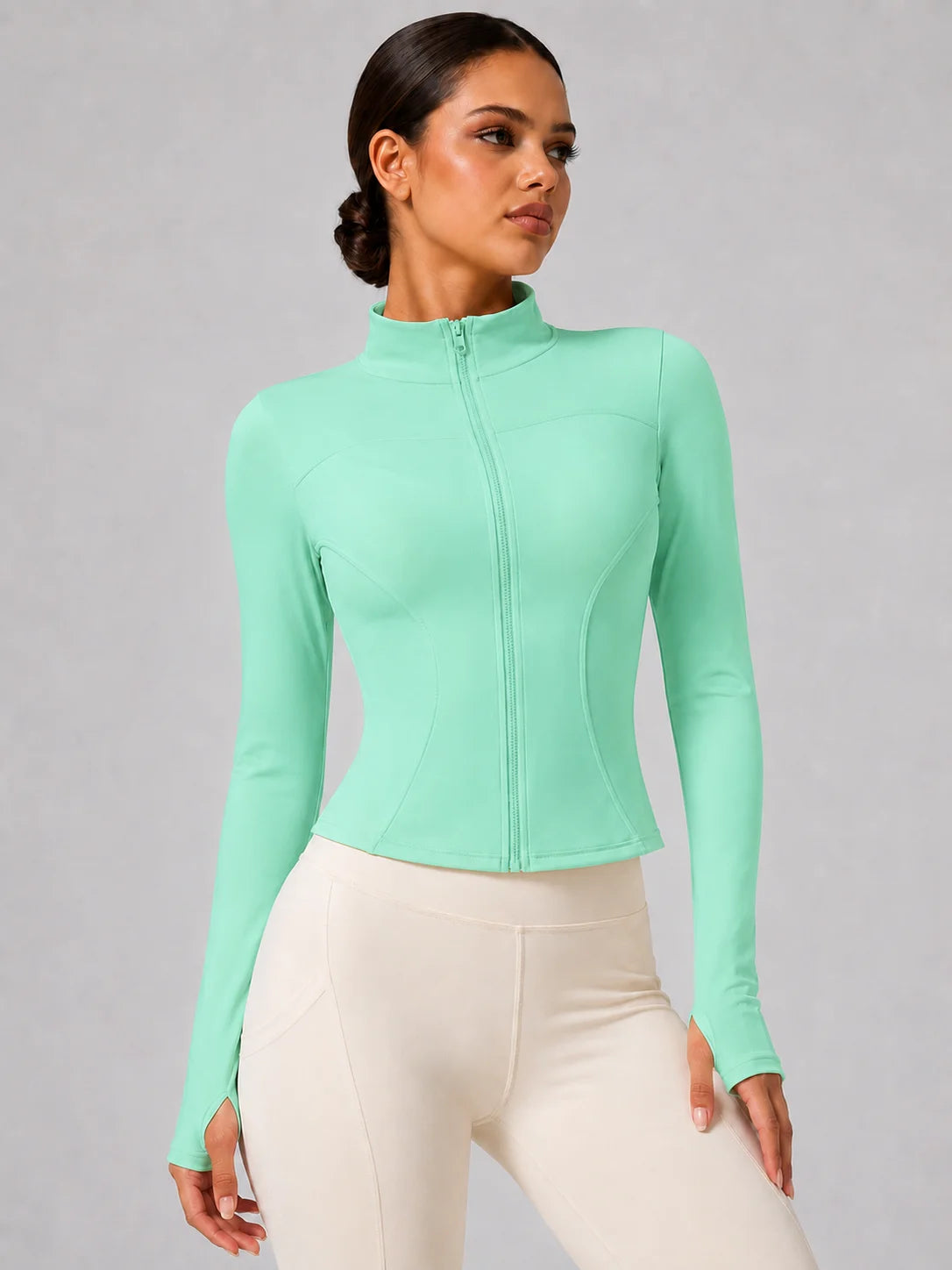 Chaqueta deportiva entallada con cremallera para mujer