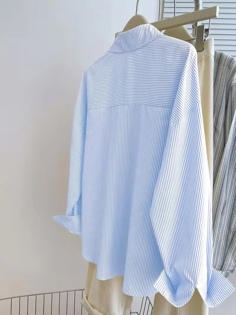 Blusa estampada con botones de manga larga