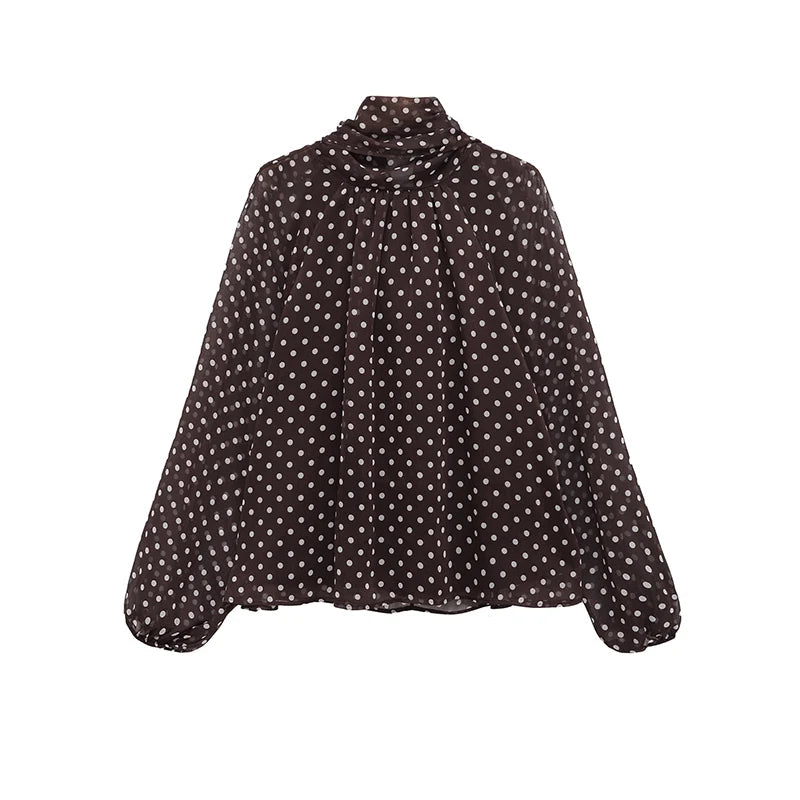 Blusa de lunares con lazo en el cuello