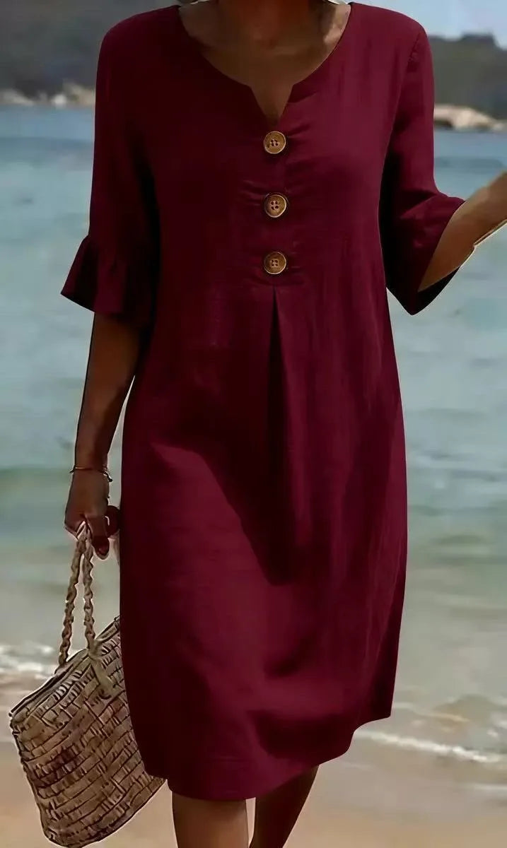 Vestido de algodón y lino con botones y volante