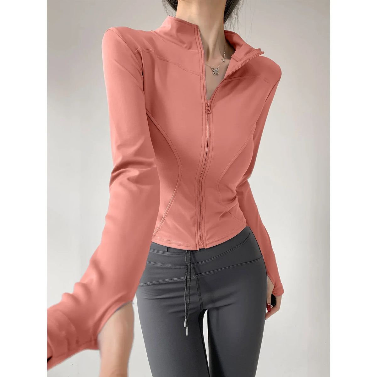 Chaqueta deportiva ajustada de secado rápido para mujer