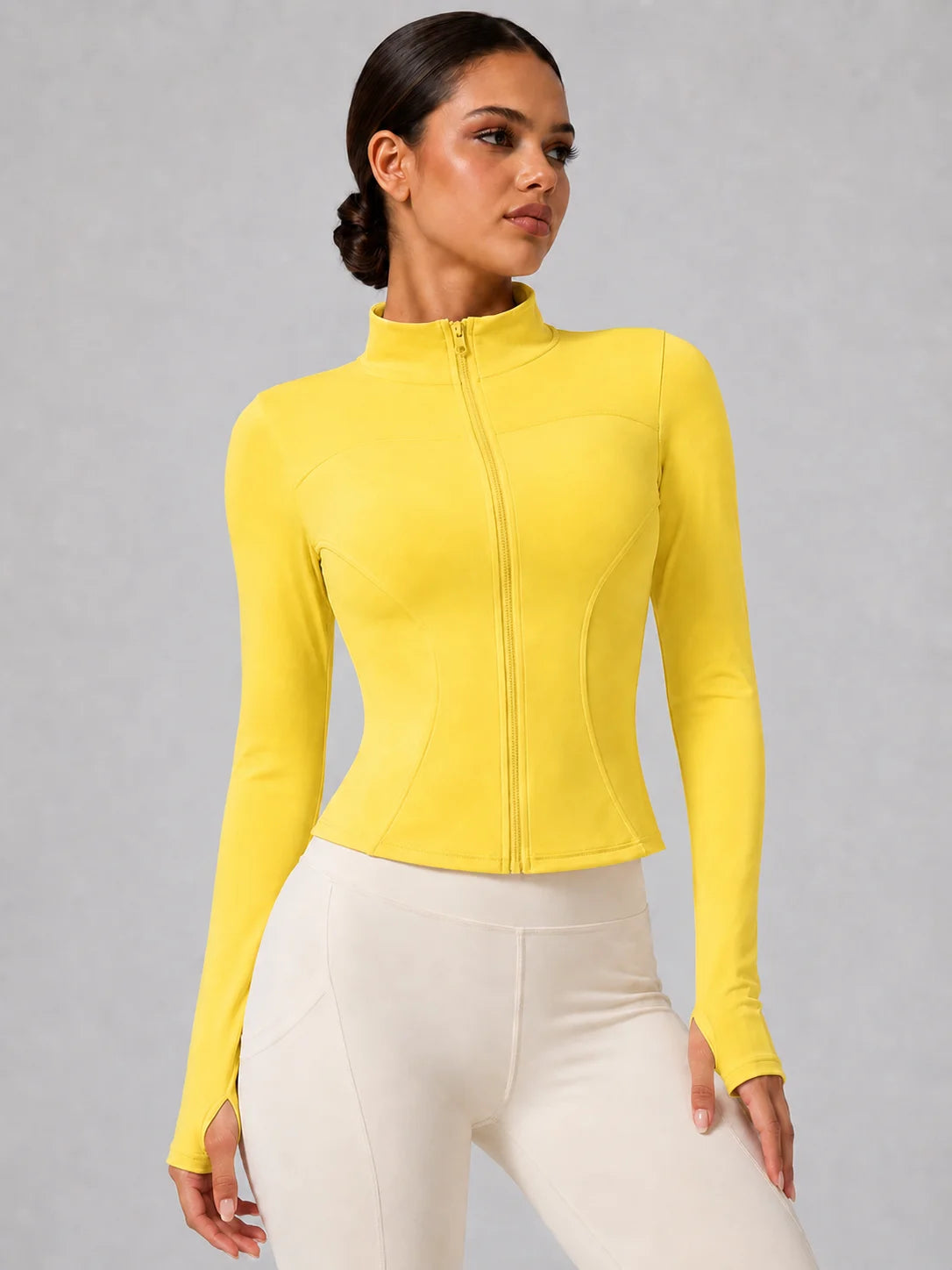 Chaqueta deportiva entallada con cremallera para mujer
