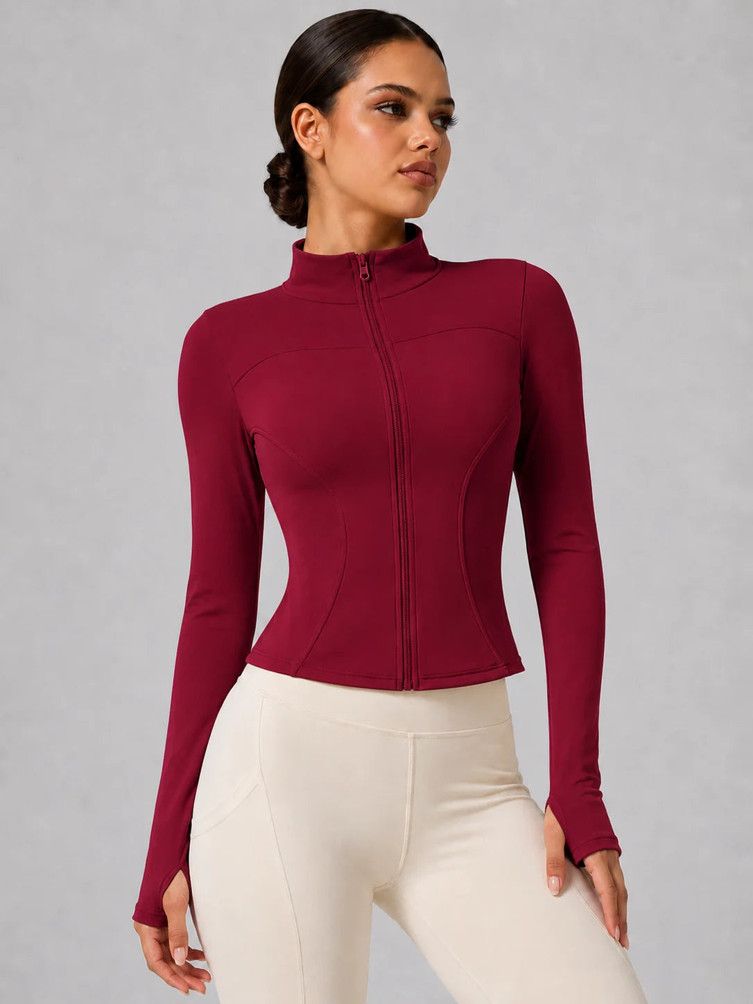 Chaqueta deportiva entallada con cremallera para mujer