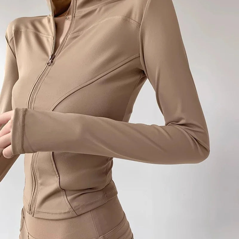 Chaqueta deportiva ajustada de secado rápido para mujer