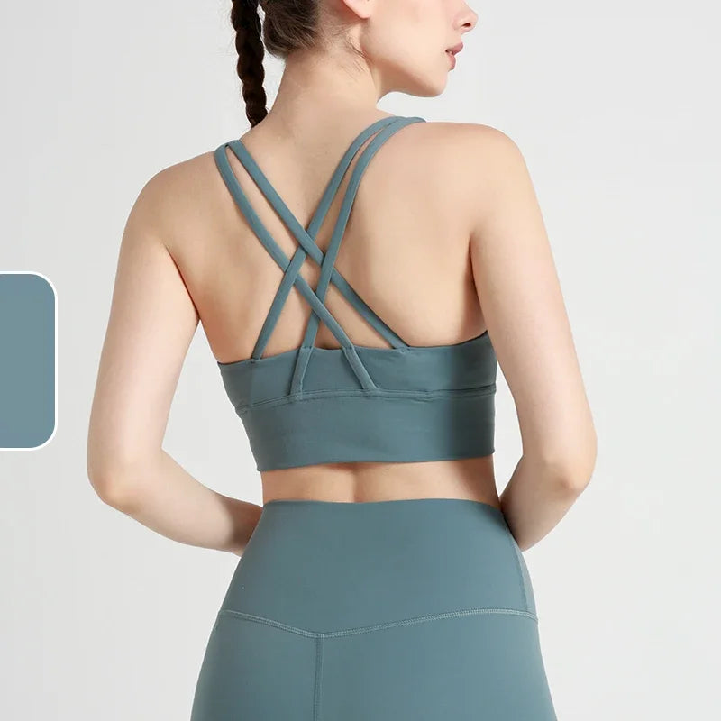 Top deportivo de espalda cruzada para mujer