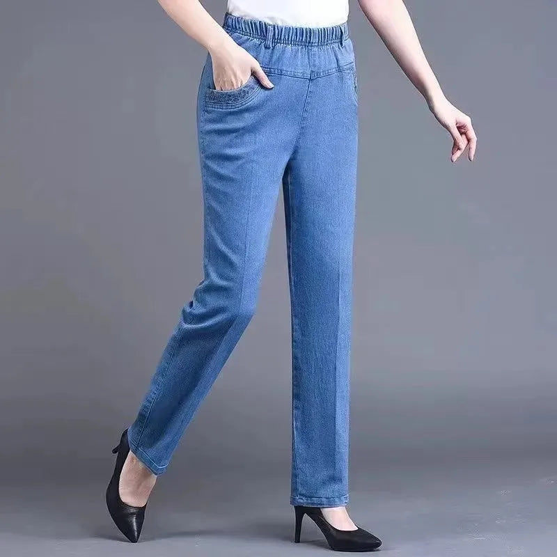 Vaqueros elásticos con bolsillos bordados (L a 6XL)
