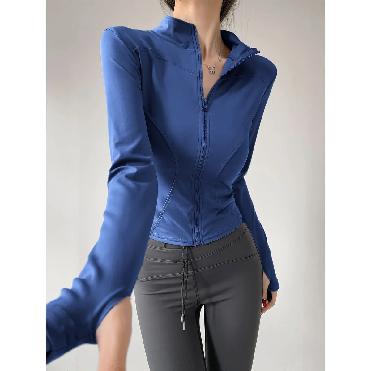 Chaqueta deportiva ajustada de secado rápido para mujer
