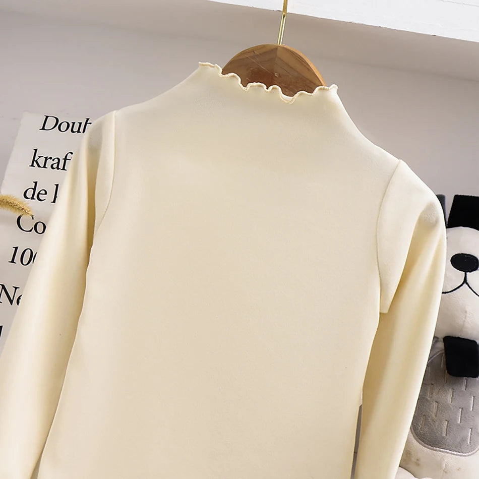 Camiseta de manga larga con cuello de volante para niña