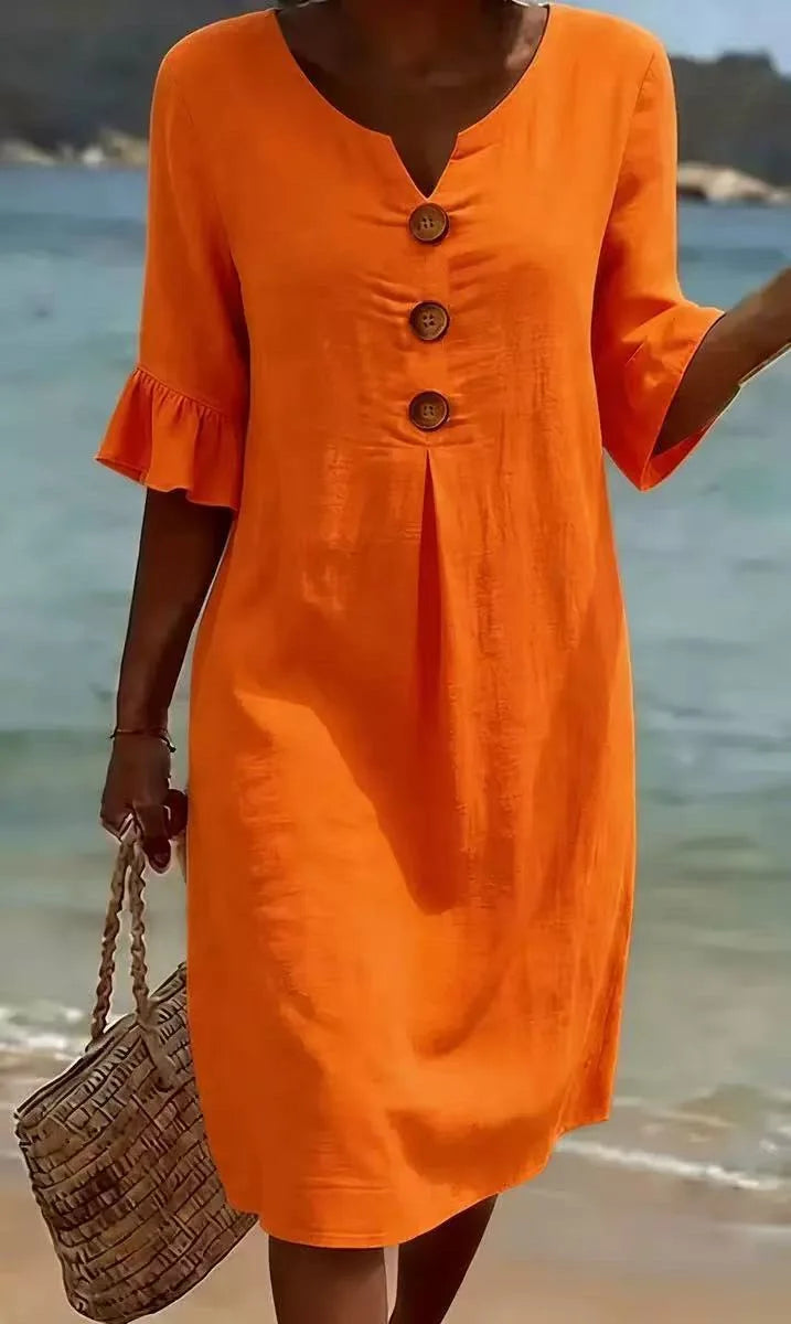 Vestido de algodón y lino con botones y volante