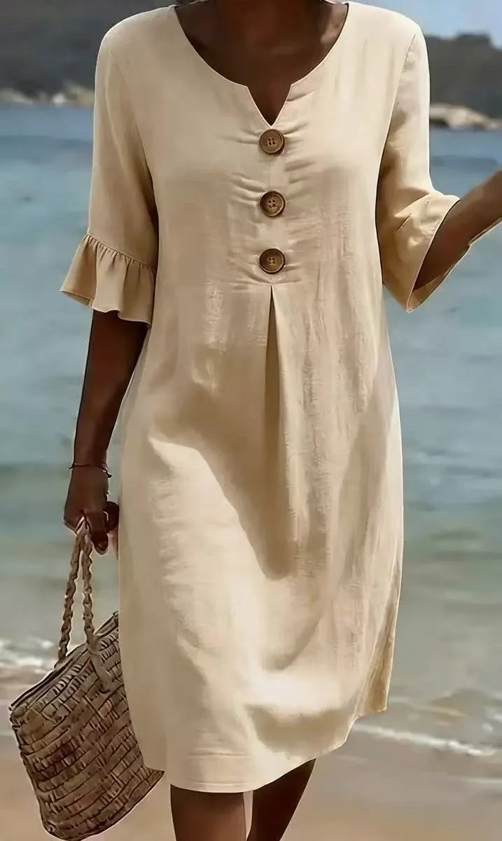 Vestido de algodón y lino con botones y volante