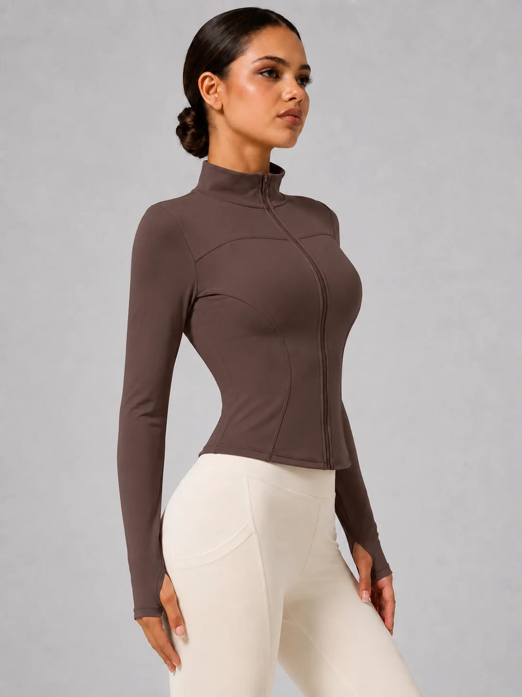 Chaqueta deportiva entallada con cremallera para mujer
