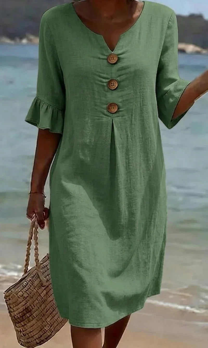 Vestido de algodón y lino con botones y volante
