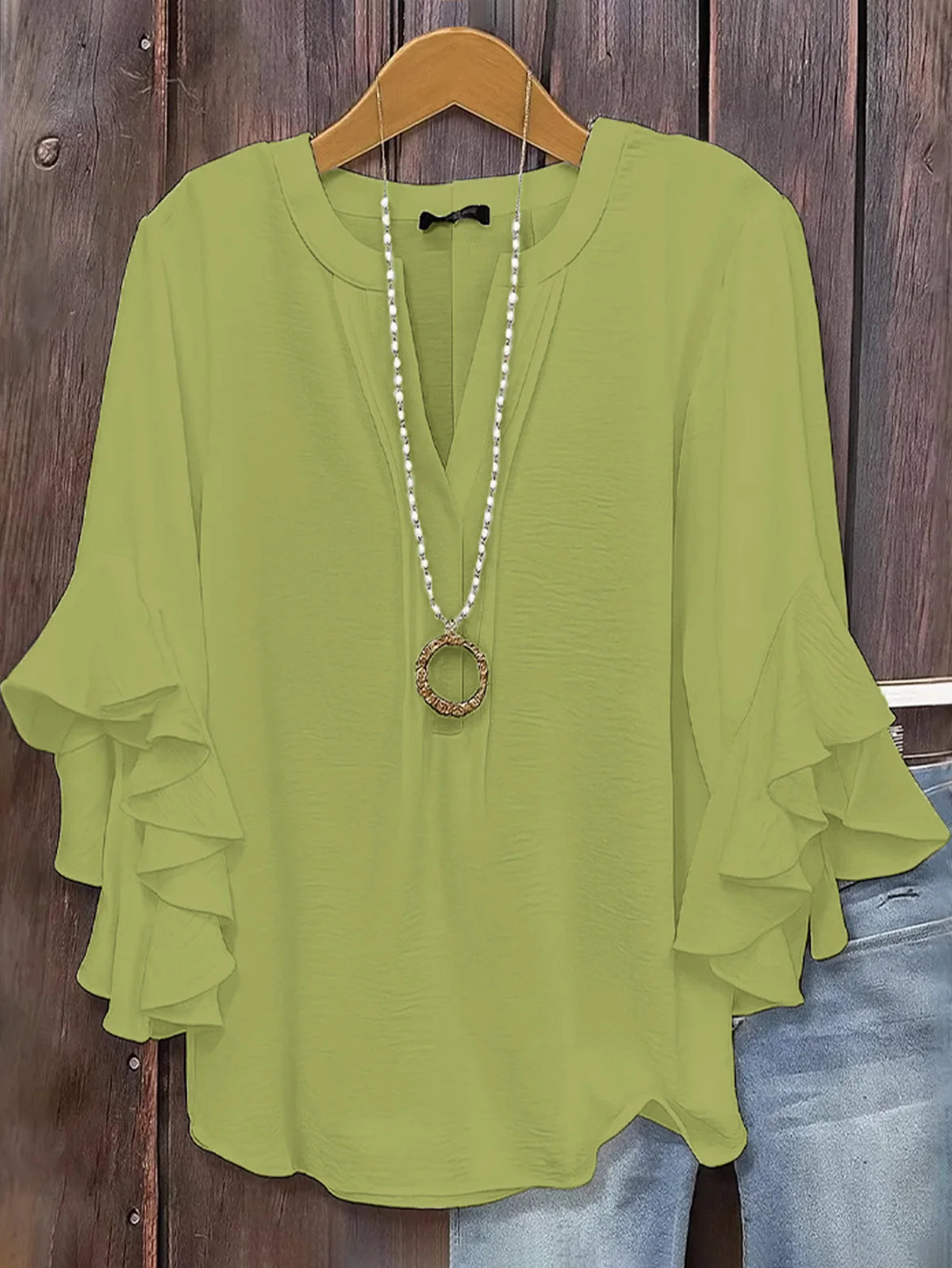 Blusa de gasa con manga de volantes y cuello en V