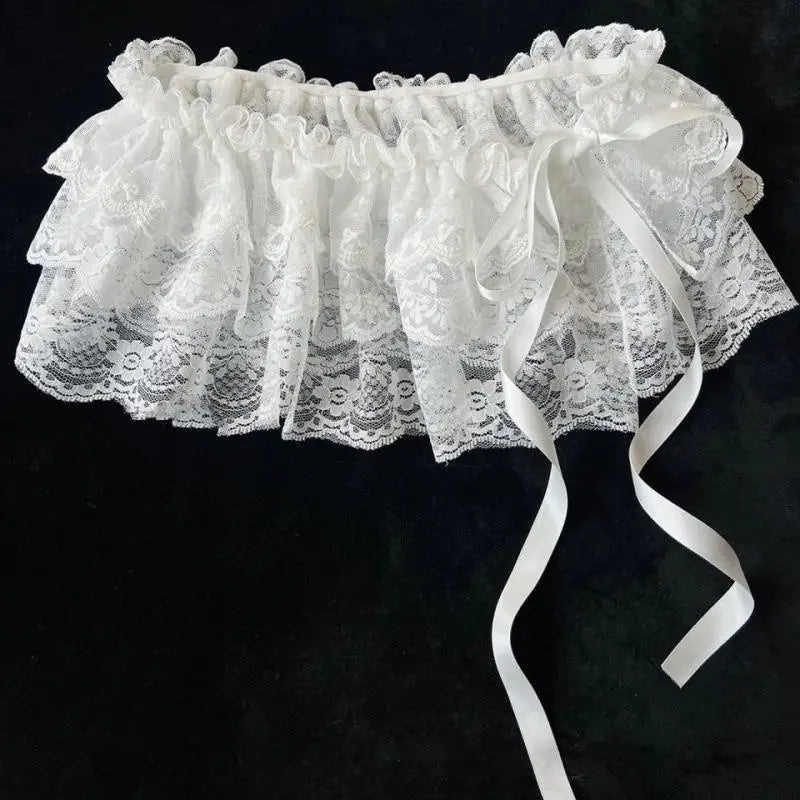 Falda corta de tul con encaje